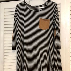 Striped black and white dress with brown pocket